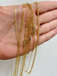 Load image into Gallery viewer, 14k Yellow Gold 1mm Dainty Cable Chain Necklace with Lobster Claw Clasp (Diamond-Cut)
