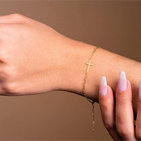 Load image into Gallery viewer, 14k Yellow Gold Sideways Cross Paperclip Chain Bracelet with Lobster Clasp
