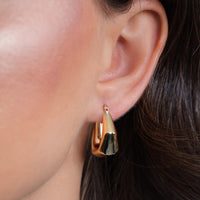 Load image into Gallery viewer, A Model Worn 14k Gold Chunky Hexagon Shape Hoop Earrings
