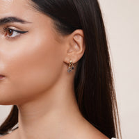 Load image into Gallery viewer, 14K Gold Huggie Hoop Earrings LOVE Heart Charms
