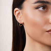 Load image into Gallery viewer, 14K Gold Sideways Heart Huggie Hoop Earrings
