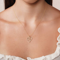 Load image into Gallery viewer, 14K Yellow Gold Dove in Heart Pendant Necklace
